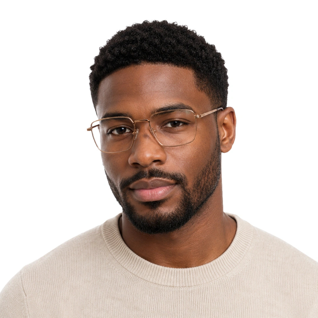 Man wearing OS ACL Genre 8003 square prescription eyeglasses in gold and brown, front view