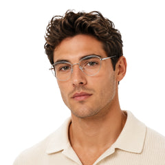Man wearing College Fashion 66110 sculpted brow cat-eye optical frame in transparent, front view
