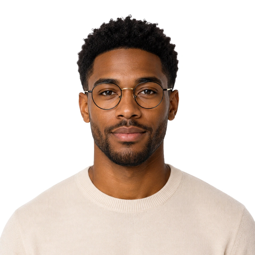 Man wearing OS GLADIATOR 10002 oval round metal prescription eyeglasses for men and women in black and gold