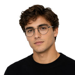 Man wearing OS GLADIATOR 10002 oval round metal prescription eyeglasses for men and women in black and silver
