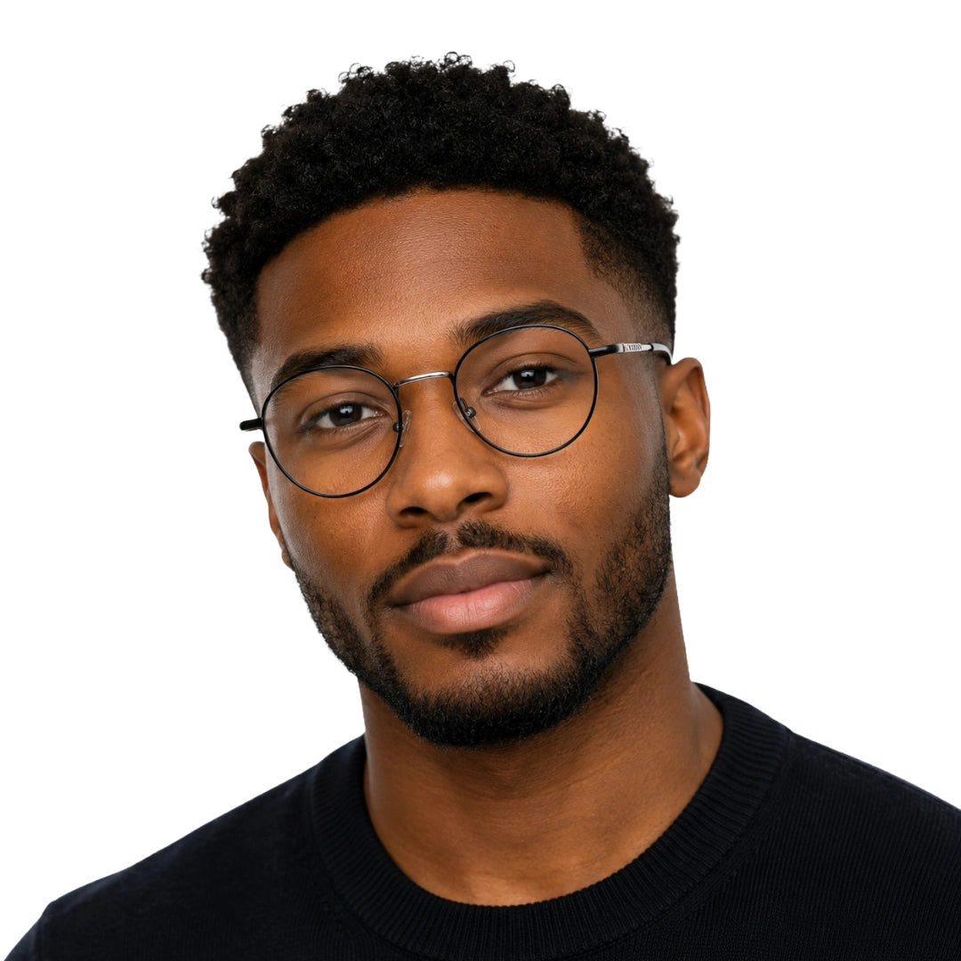 Man wearing OS GLADIATOR 10002 oval round metal prescription eyeglasses for men and women in black and silver, front view