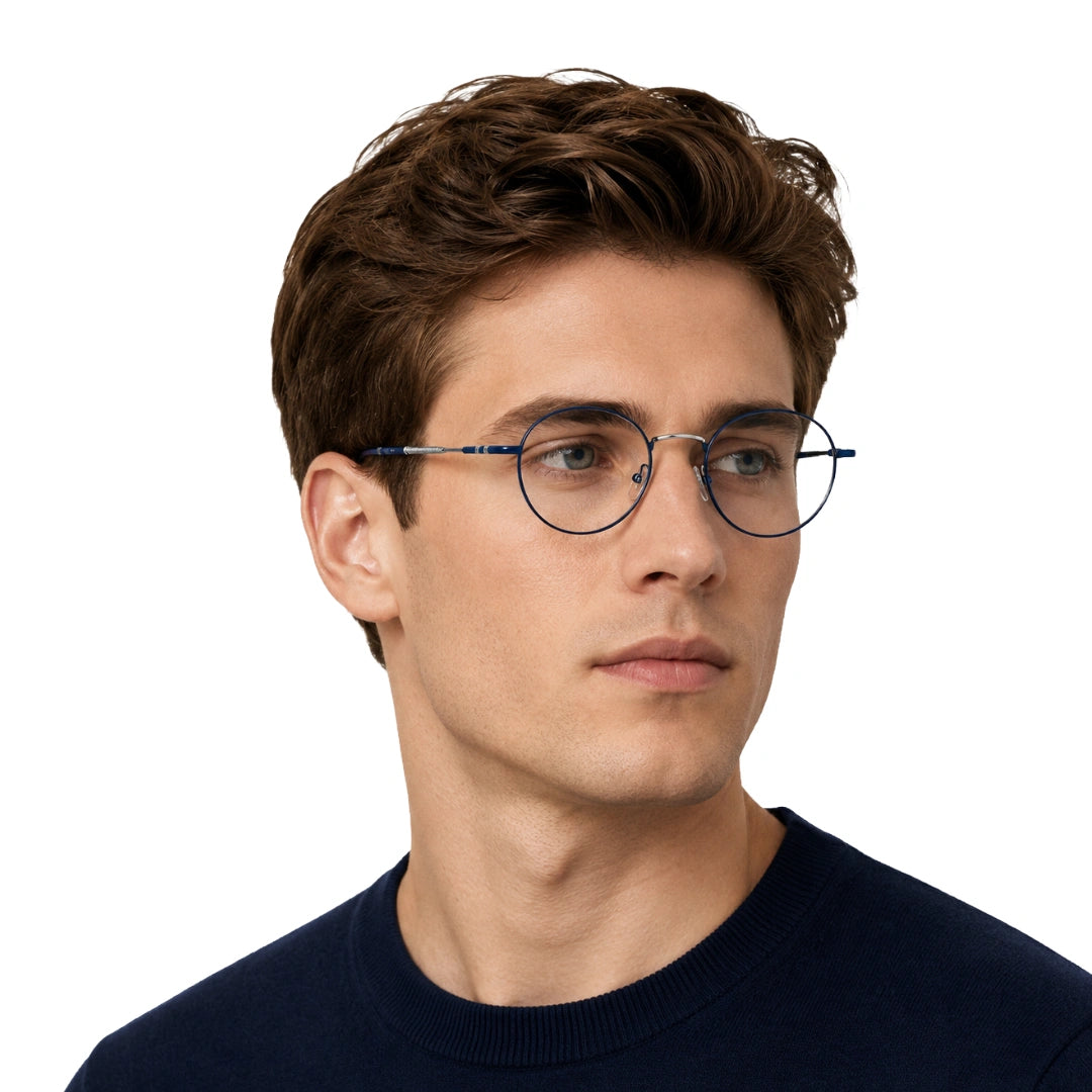 Man wearing OS GLADIATOR 10002 oval round metal prescription eyeglasses for men and women in silver and blue, front view