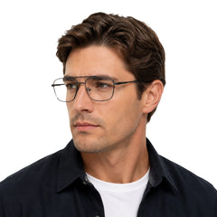 Man wearing OS PrismX 75111 double bridge square metal eyeglasses in gunmetal, front view