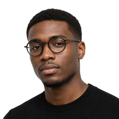 Man wearing OS Slomga 31006 dual-material round prescription frame in black, front view