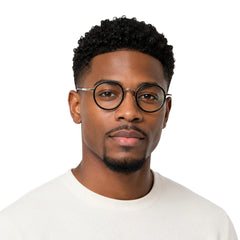 Man wearing OS Slomga 31006 dual-material round prescription frame in black and silver, front view