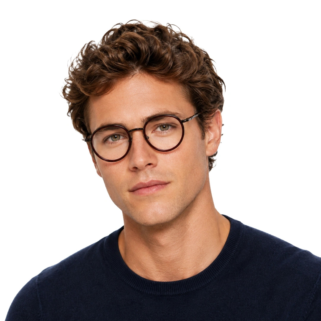 Man wearing OS Slomga 31006 dual-material round prescription frame in brown