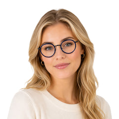 Woman wearing OS Slomga 31006 dual-material round prescription frame in dark blue