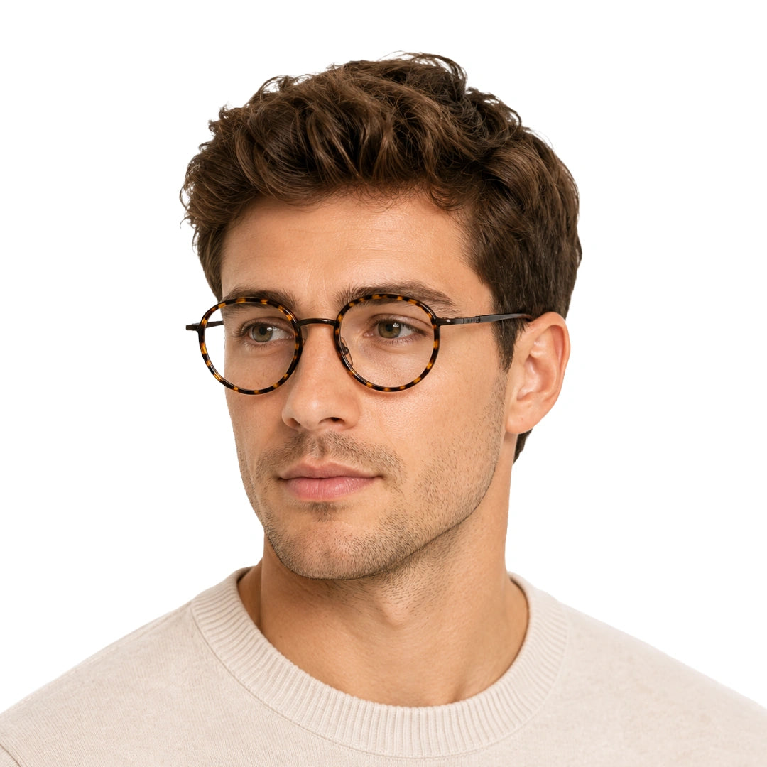 Man wearing OS Slomga 31006 dual-material round prescription frame in tortoise shell