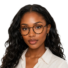 Woman wearing OS Slomga 31006 dual-material round prescription frame in tortoise shell, front view
