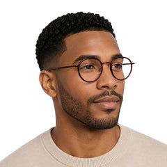 Man wearing OS Slomga 31006 dual-material round prescription frame in wine
