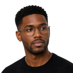 Man wearing OS Solitude 15103 round saddle bridge metal prescription eyeglasses, front view