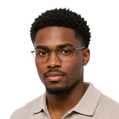 Man wearing OS Solitude 15104 full-rim round metal eyeglasses in gunmetal and white, front view
