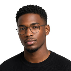 Man wearing OS Solitude 15106 lightweight round prescription glasses in gunmetal and black, front view