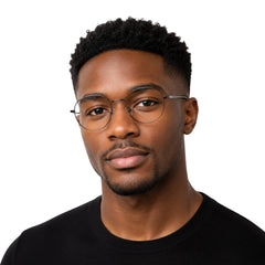 Man wearing OS Solitude 15107 classic round metal prescription eyeglasses in gunmetal and black